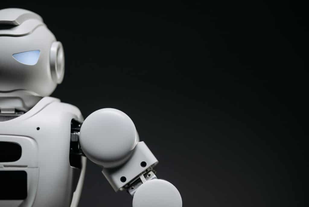 A robotic figure representing AI in SEO services with a sleek design on a dark background