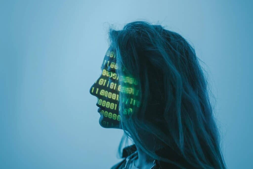 Silhouette of a person with binary code projected on their face representing AI in language translation services