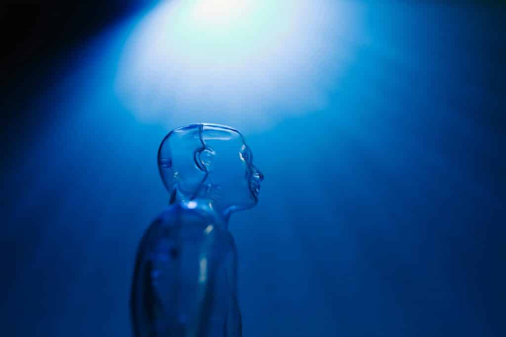 Transparent figure in blue light representing AI for HVAC companies