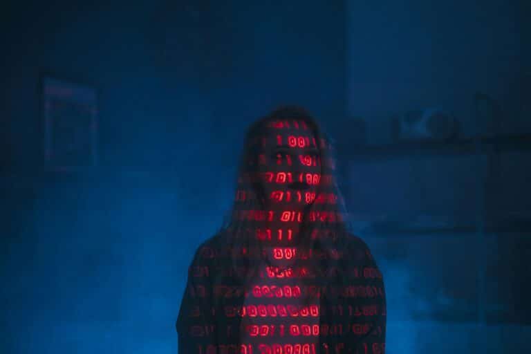 Conceptual image of a woman overlaid with binary code, representing AI for Proposal Planning Services.